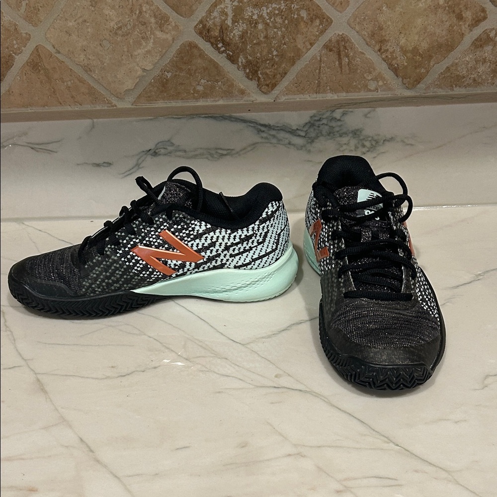 New Balance Kids Black and Orange Sneakers